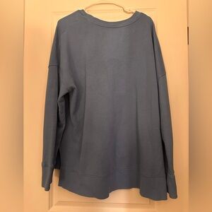 Woman’s Blue Sweater